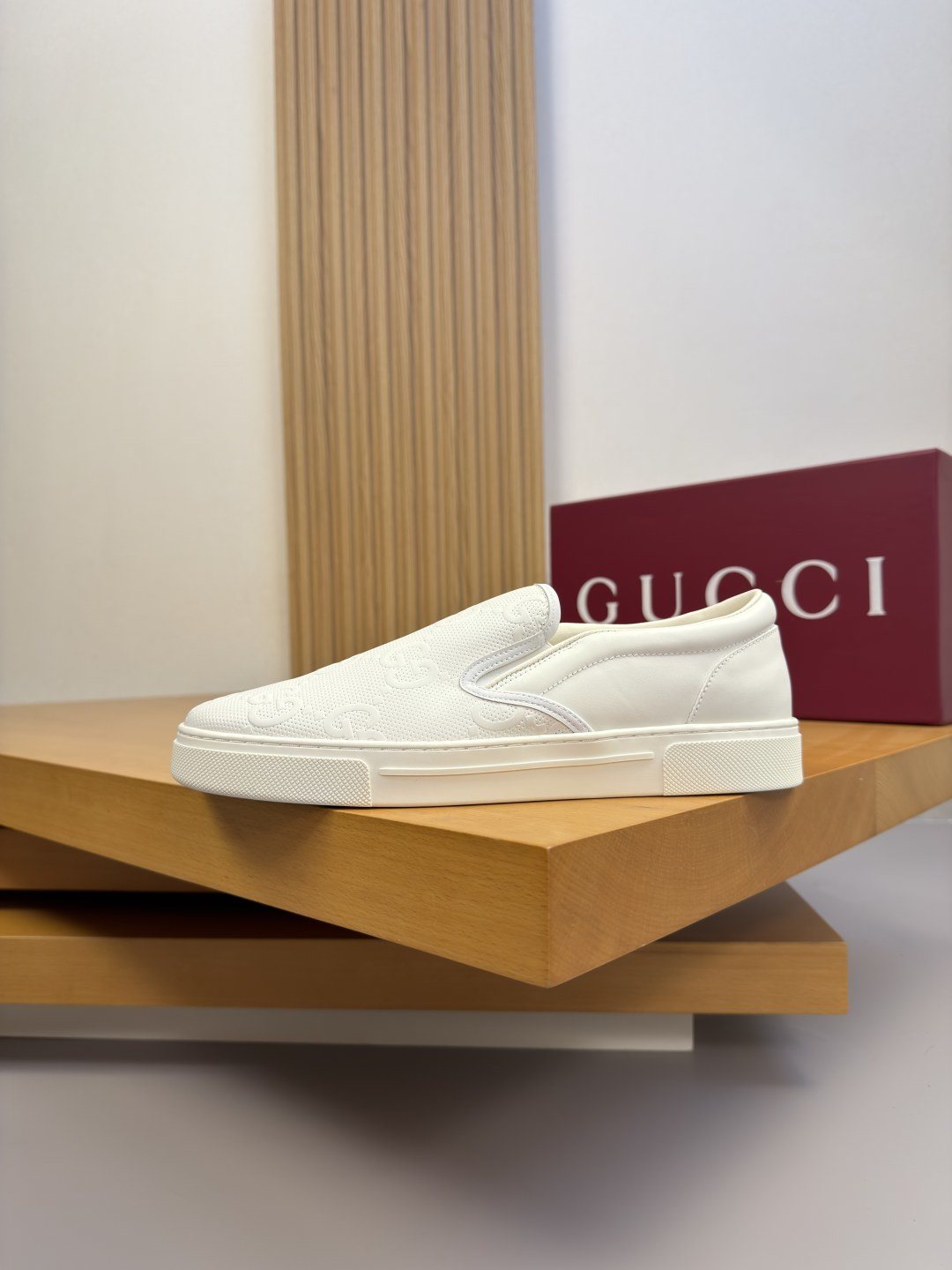 Ivory White Embossed Slip-On Sneakers
